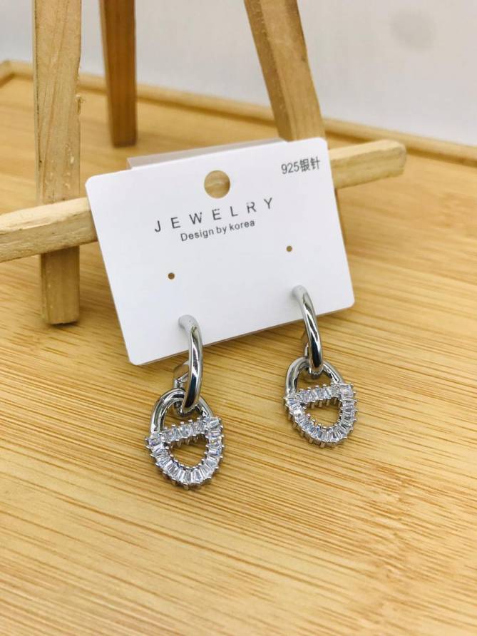 2 AD Diamond Steel And Rose Gold Party Wear Earrings Manufacturers
